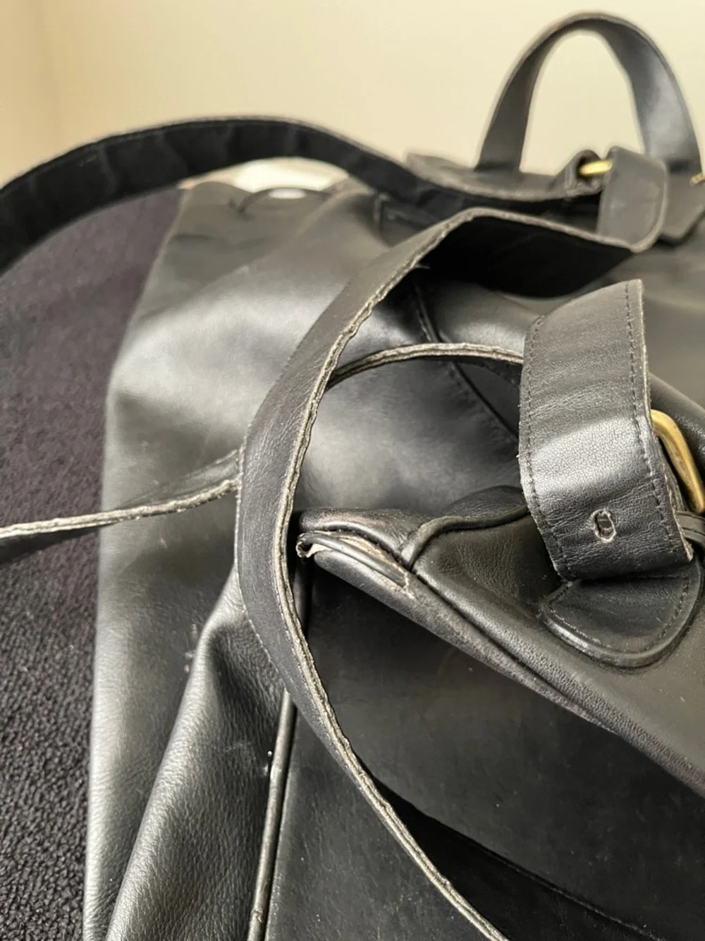Coach Black Leather Drawstring Backpack with Front Zip Pocket